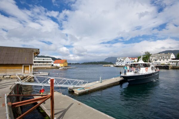 Boat from FjordGuiding in the harbour in Selje.