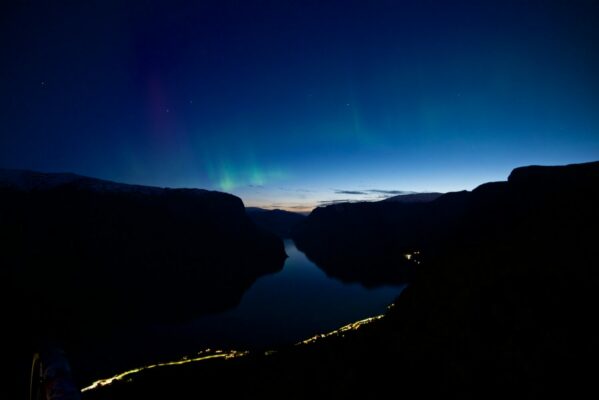 Northern lights above the Aurlandsfjord seen from Stegastein viewpoint.